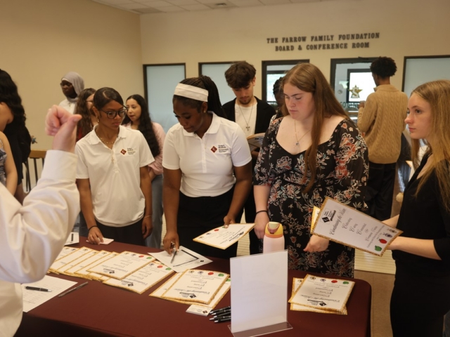 Students Sign in To Recognition Ceremony